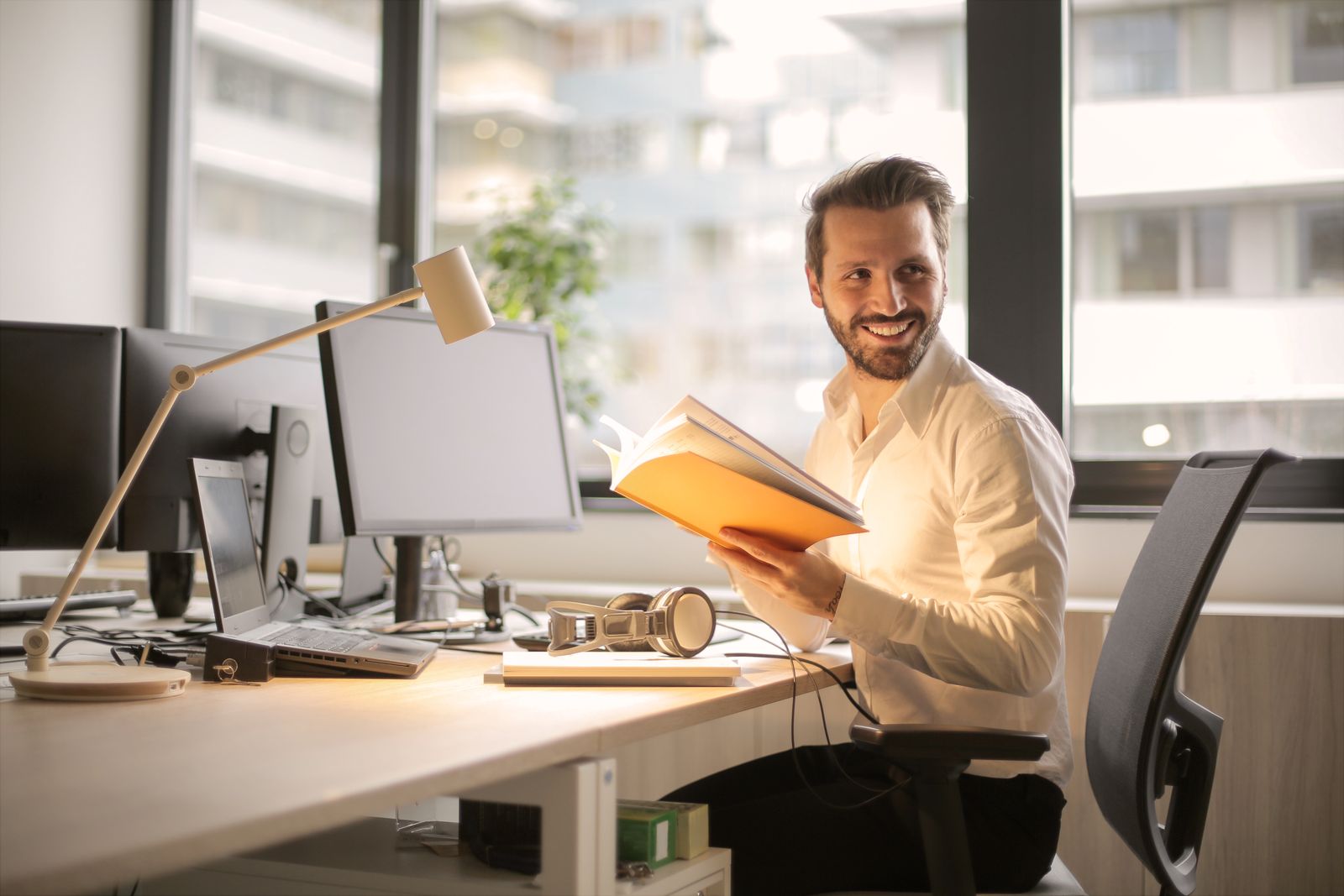 Person reviewing financial options at a home desk